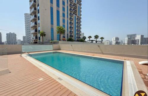 Jumeirah Village Circle Apartment | Vogue Vacation Homes, JVC Jeewar Tower near Circle Mall, One Bedroom Apartment with Balcony and City View, Access to all Amenities