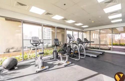 Jumeirah Village Circle Apartment | Vogue Vacation Homes, JVC Jeewar Tower near Circle Mall, One Bedroom Apartment with Balcony and City View, Access to all Amenities