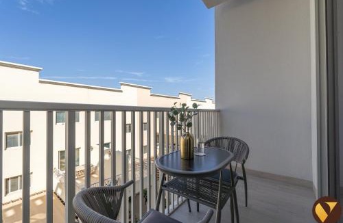 Jumeirah Village Circle Apartment | Vogue Vacation Homes, JVC Luma22 near Circle Mall, Studio Apartment with Balcony and Vibrant Community View, Access to all Amenities