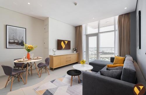 Jumeirah Village Triangle Apartment | Vogue Vacation Homes, Novotel Residences JVT near Springs Souk Mall, One Bedroom apartment with Balcony and Vibrant Community View, Access to all Amenities