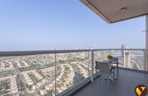 Jumeirah Village Triangle Apartment | Vogue Vacation Homes, Novotel Residences JVT near Springs Souk Mall, One Bedroom apartment with Balcony and Vibrant Community View, Access to all Amenities