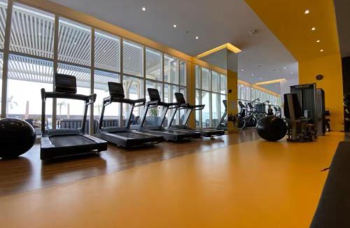 Jumeirah Village Triangle Apartment | Vogue Vacation Homes, Novotel Residences JVT near Springs Souk Mall, One Bedroom apartment with Balcony and Vibrant Community View, Access to all Amenities