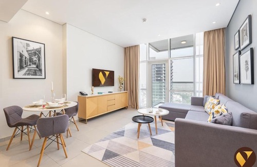 Jumeirah Village Triangle Apartment | Vogue Vacation Homes, Novotel Residences JVT near Springs Souk Mall, One Bedroom Apartment with Large Balcony and Vibrant Community view, Access to all Amenities