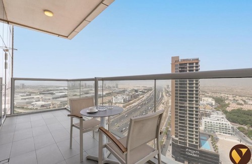 Jumeirah Village Triangle Apartment | Vogue Vacation Homes, Novotel Residences JVT near Springs Souk Mall, One Bedroom Apartment with Large Balcony and Vibrant Community view, Access to all Amenities