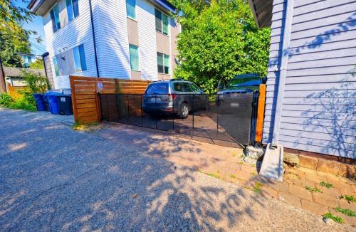 University District House | Walk to UW and Light Rail 3BR Seattle Craftsman With AC Gym 2 Gated Parking Spots and Security
