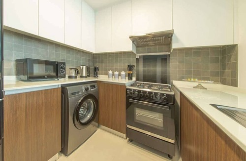 Al Hamriya Apartment | Waterfront Apt w/Lagoon Views & Pool, Blue Bay