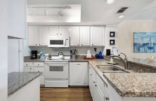 Shelter Cove Condo | Waterfront condo with walkable locale, central AC, washer dryer, & shared pool