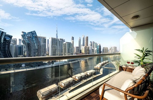Business Bay Apartment | Waterfront Escape | Burj & Canal View | Pool+Sauna