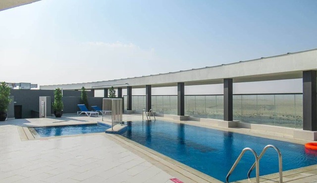 Bright and Modern 2BR Apartment near DWC Airport