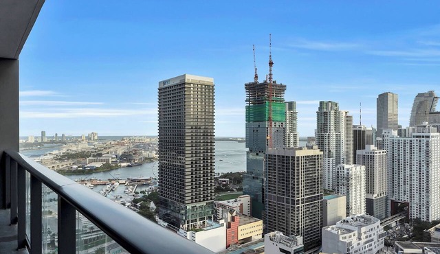 Charming 2-bedroom apartment in enchanting Miami with water and city view.