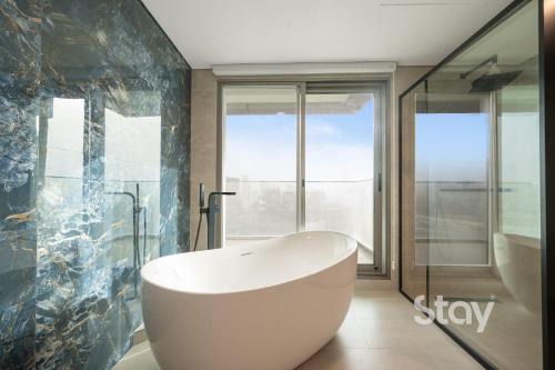 Chic 2BR Wellness Apt with Free Massage JVT