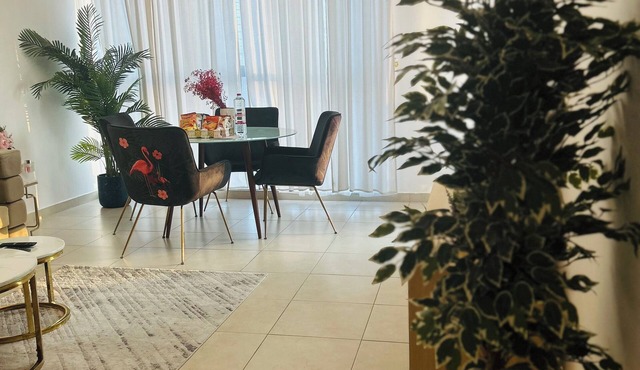 Cozy 1-bedroom apartment in nice Dubai Land with WiFi, Fitness Room & Pool