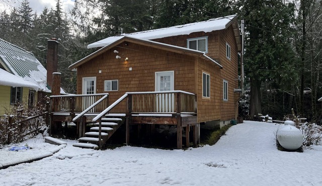 Riverfront Cabin Retreat, base camp for skiing and hiking, or a quiet getaway.