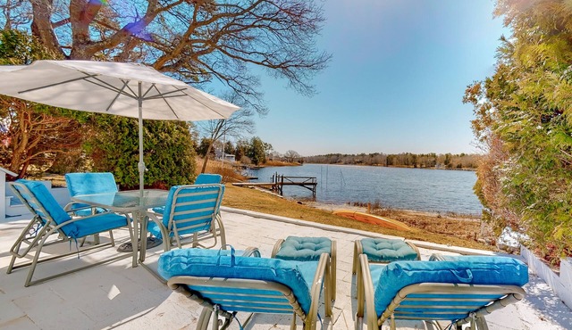Single-level riverfront retreat, electric fireplace, & washer/dryer in Wareham