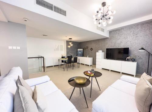 Stylish 2BR Duplex Apartment with Balcony & Access to Pool