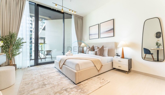 Stylish Stay Near Dubai Autodrome & Trump Golf Club, Binghatti Amber, by Deluxe Holiday Homes