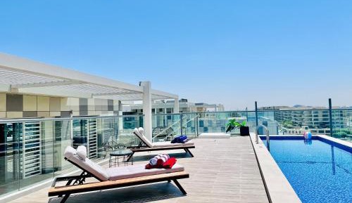Four-Bedroom Apartment with Pool View