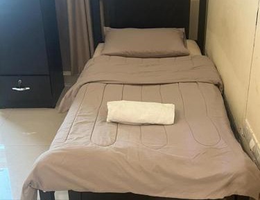 Single Bed in Dormitory Room