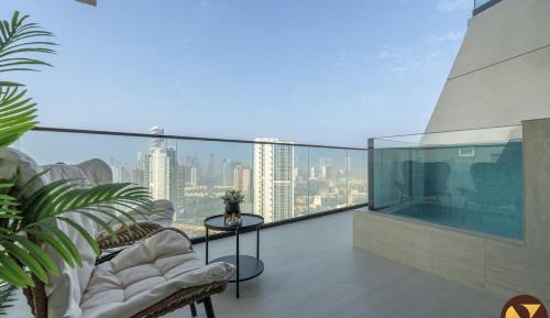 One-Bedroom Apartment with Balcony and City View