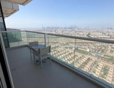 One-Bedroom Apartment with Balcony and City View