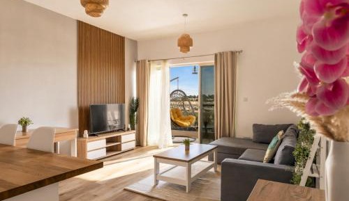 One-Bedroom Apartment with Balcony and City View