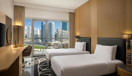 Deluxe Twin Room with Balcony and City View