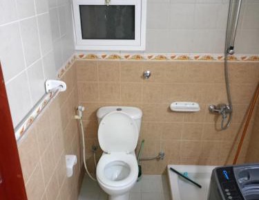 Single Bed in Dormitory Room