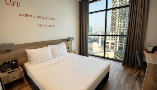 Deluxe Room King Bed with City View (includes 15% off F&B)